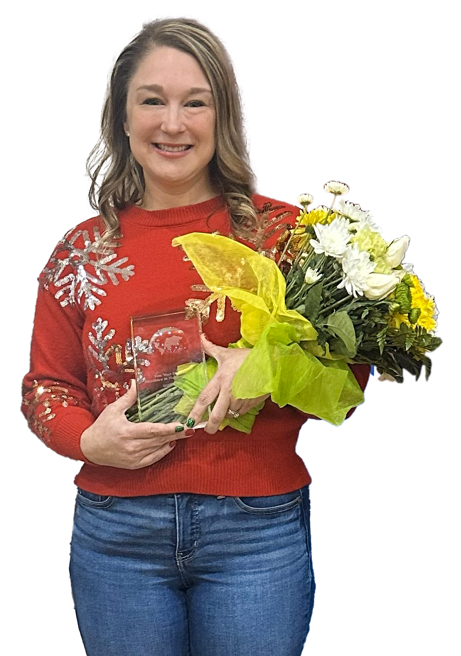 Caitlin Stump holding her Kim West Dinsdale Excellence in Teaching Award and a bouquet of flowers